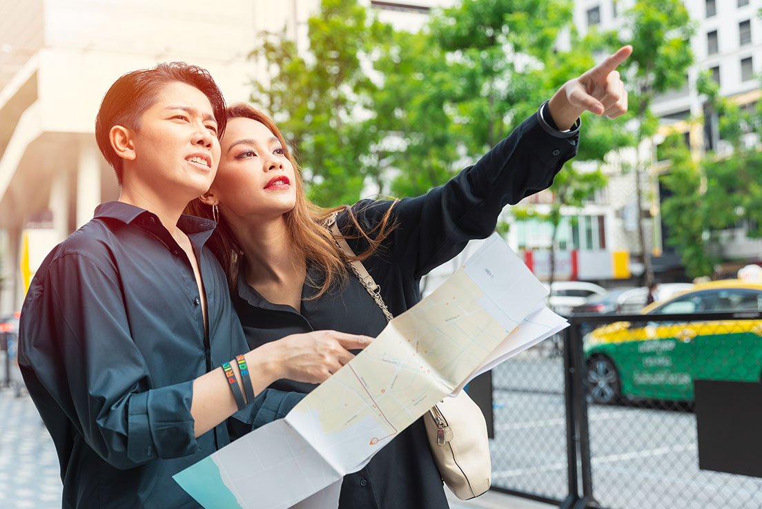 Asian women friend travel together help pointing l 2022 10 31 07 09 15 utc.jpg